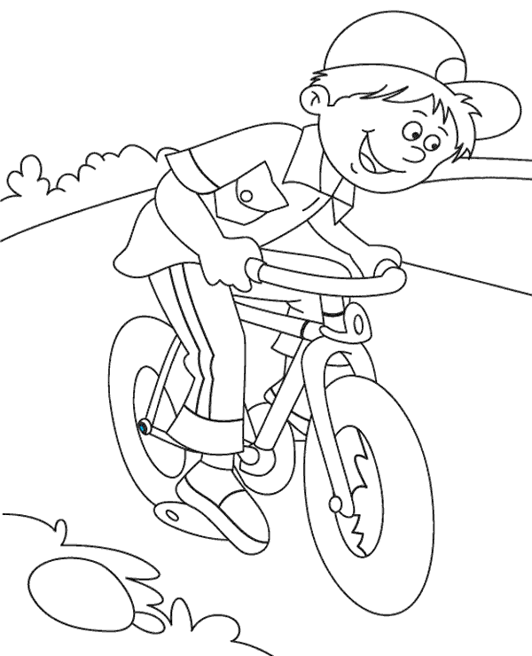 Happy boy riding on bicycle