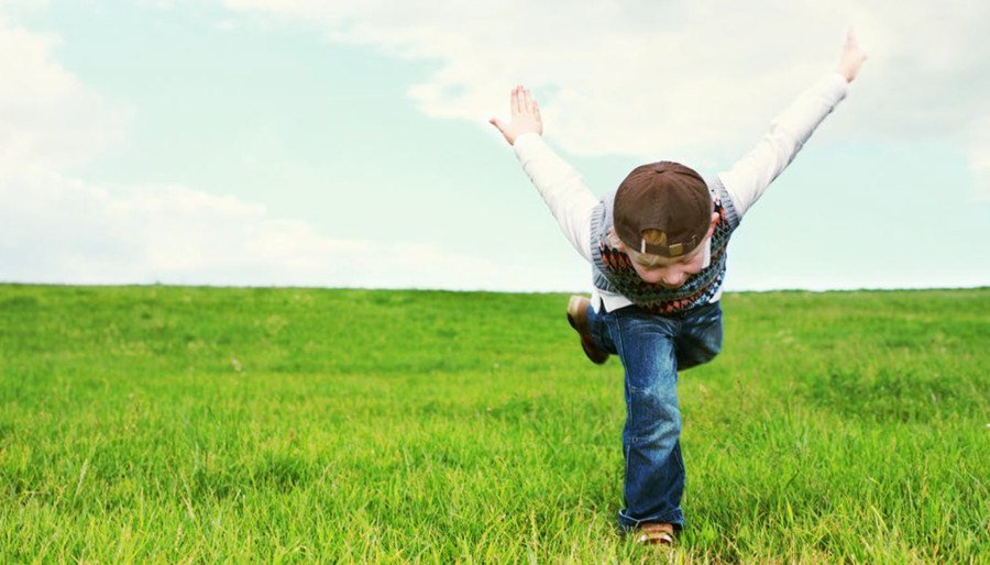 Happy child on a meadow